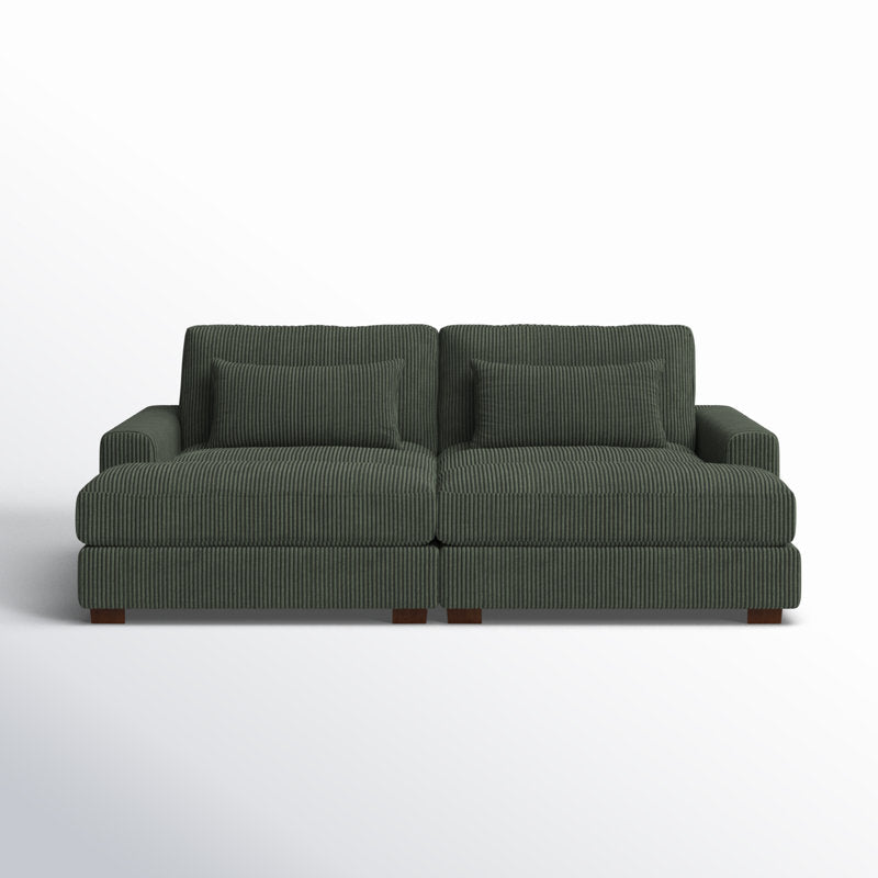 An Etta Avenue Mordecai 90'' Square Arm Sofa in green corduroy, featuring two large seat cushions and matching back cushions, set against a plain light background. This sofa offers a modern design with clean lines and a generous, comfortable seating area.
