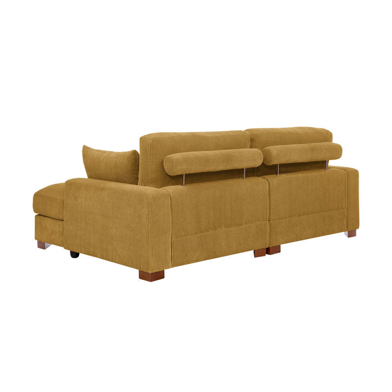 The Etta Avenue Mordecai 90'' Square Arm Sofa is displayed from the back, showcasing its mustard yellow hue, chaise lounge extension, textured fabric, adjustable headrests, and wooden block feet.