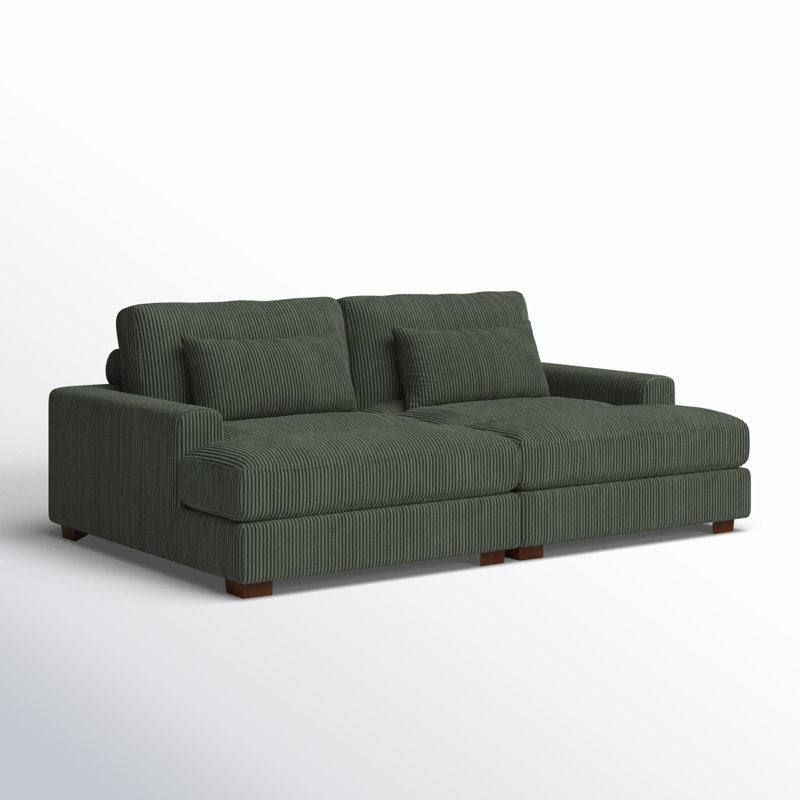 An Etta Avenue Mordecai 90'' Square Arm Sofa upholstered in dark green corduroy, featuring two spacious seat cushions, two back cushions, and two decorative pillows. The sofa showcases a modern design with wooden legs and is displayed against a plain white background.