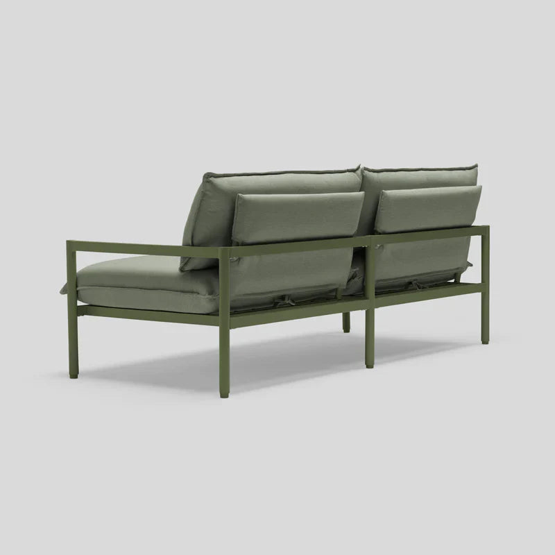 The Terra Loveseat features a sleek, modern design with a minimalist metal frame in dark green and dual cushioned backrests in a matching shade. Set against a light gray background, it highlights its contemporary aesthetic and sturdy structure.