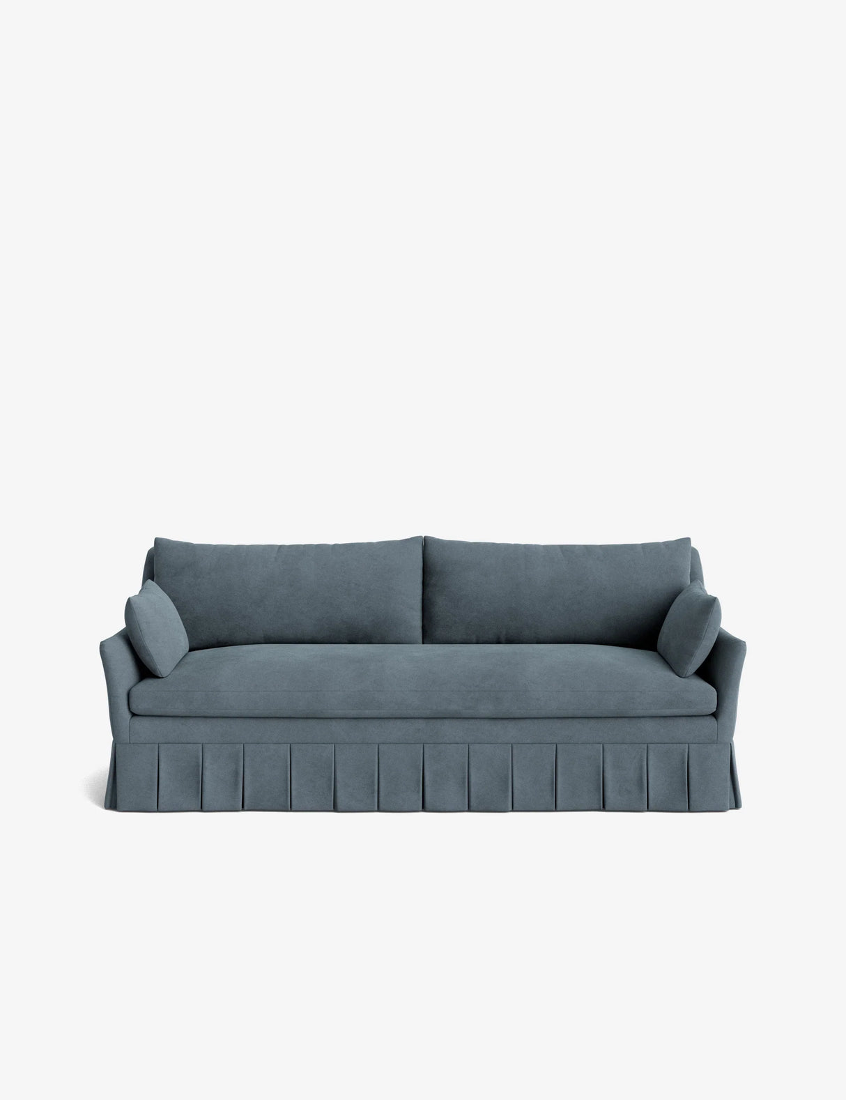 Introducing the Portola Pleated Sofa: a luxurious teal-colored piece featuring two large cushions and two side pillows. Its classic and elegant design is enhanced by a pleated skirt at the base, all set against a plain white background.
