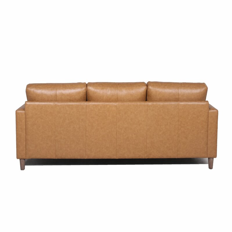 The Portland 80.5" Leather Sofa, seen from the back, features a sleek, modern design with clean lines in brown leather. It comes with three back cushions and wooden legs, offering a contemporary and stylish look.