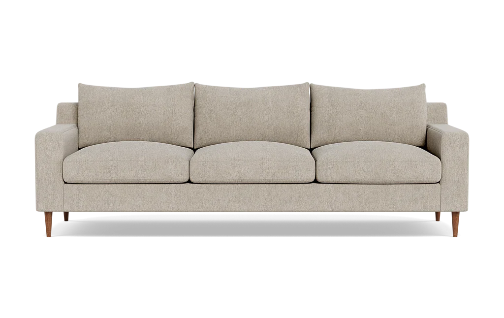 The Sloan Custom 3-Seat 95" Sofa features three seats and boasts a minimalist and modern design with its straight arms and wooden legs. It comes in beige and includes three back cushions along with three seat cushions.