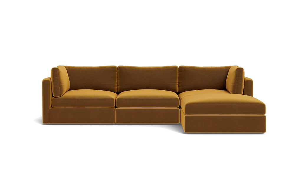 Introducing the Tatum Modular 3 Seat Chaise 106" Sectional, a modern sectional sofa in a striking mustard color. It features three seat cushions and an attached chaise lounge with clean lines, rectangular armrests, and a minimalist design set against a black background.