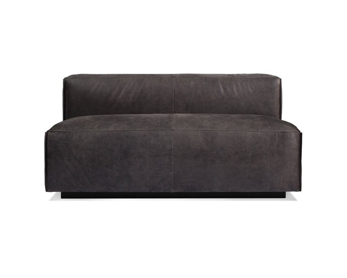 The Cleon Modern Unarmed Sofa is a dark gray, contemporary loveseat featuring a minimalist design and a low backrest, crafted from smooth fabric. It is set against a plain white background.