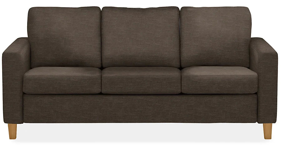 The Berin Day & Night Sleeper Sofa features a modern and minimalistic design, with plush cushions, straight armrests, and wooden legs. It is a brown three-seater set against a white background.