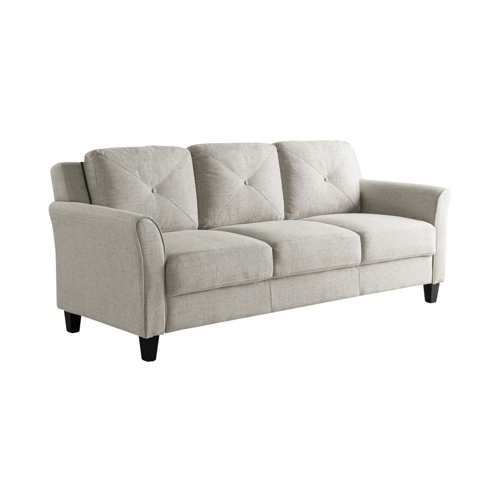 Introducing the iLounge Harvard Microfiber Sofa: a neutral-colored, three-seater masterpiece featuring tufted back cushions and gently curved armrests. Its minimalist design is complemented by sleek black wooden legs, making it an ideal addition to any modern living room.