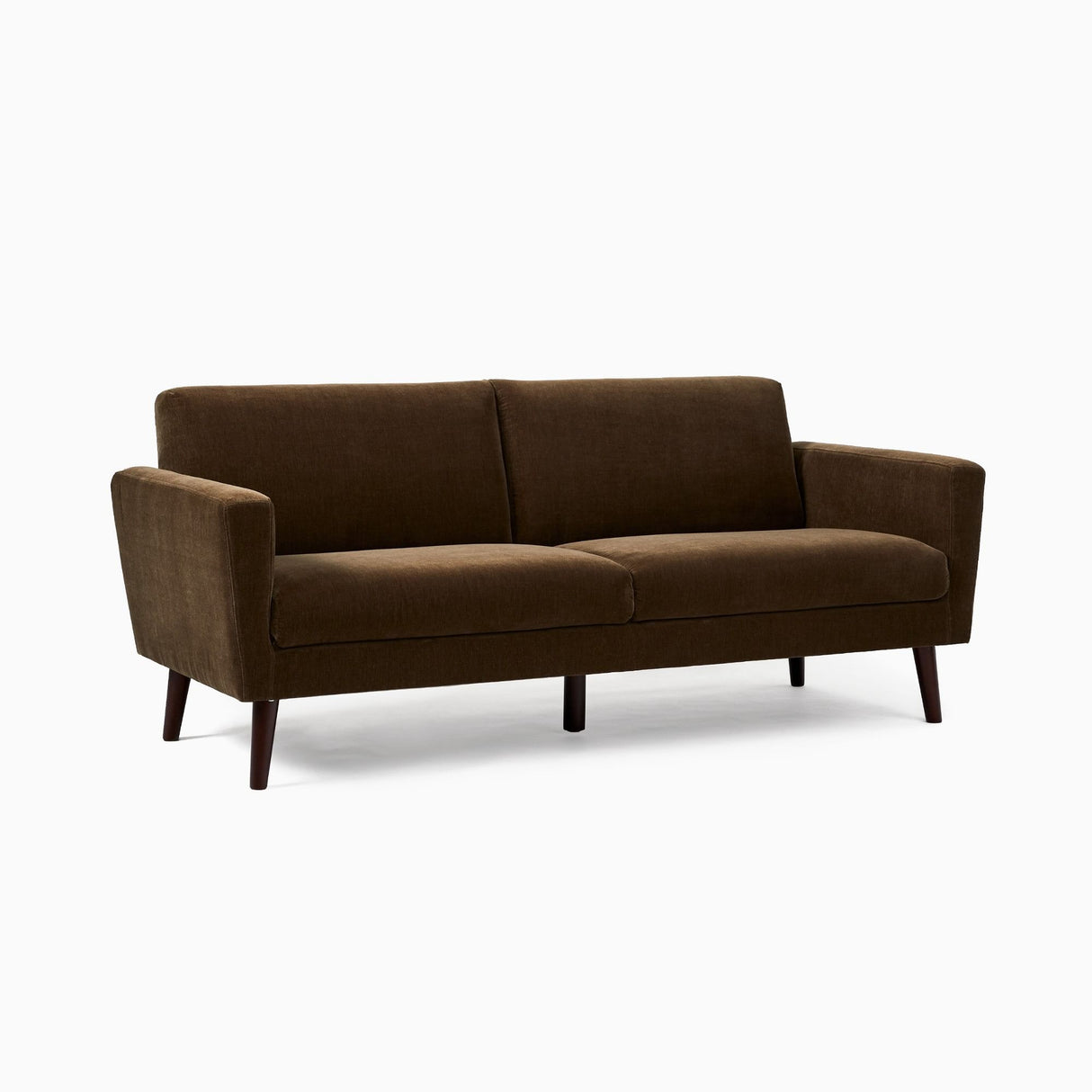 The Oliver sofa, a brown, mid-century modern piece with clean lines and wooden legs, is displayed against a white background. It includes two cushions and slightly angled armrests for a classic, minimalist appearance.