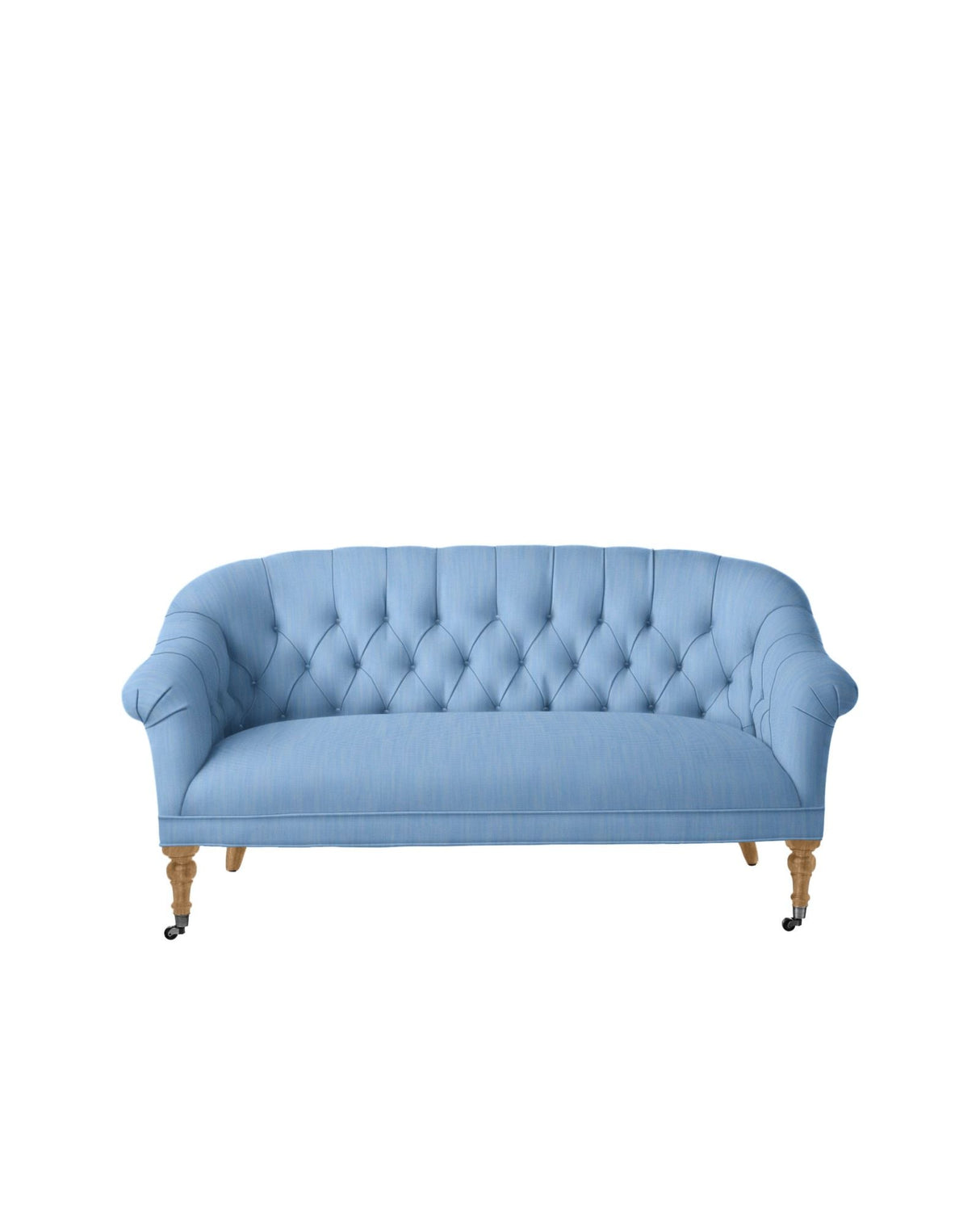 The Paxton Tufted Loveseat, featuring a light blue upholstery with curved arms and a wooden frame, stands on caster wheels. It boasts a classic design with three cushioned seats and is showcased against a plain white background.