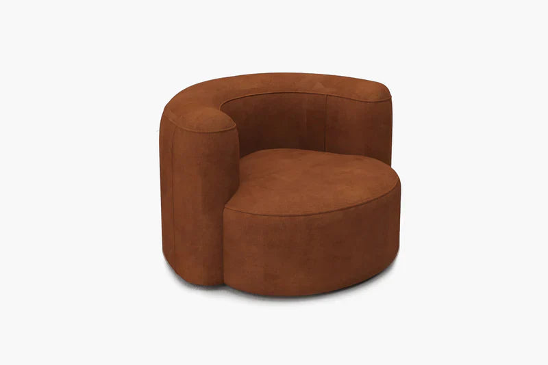 The Mellow Sectional Sofa by Acanva is a modern, barrel-shaped armchair with a smooth, rounded design. It features a plush seat and backrest, all enveloped in suede-like fabric, set against a plain white background.