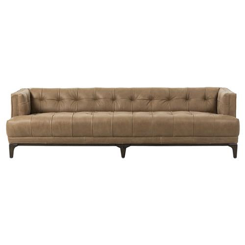 The Allen Mid Century sofa is a modern piece with green velvet upholstery, featuring button tufting, a low backrest, and square armrests. It boasts wooden legs and a sleek, minimalist design.