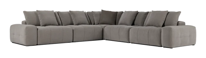 The Fullerton Modular Sofa 04 is a large, gray sectional sofa that offers plush cushions. It is configured in an L-shape and showcases a modern, minimalistic design with deep seating and broad armrests.
