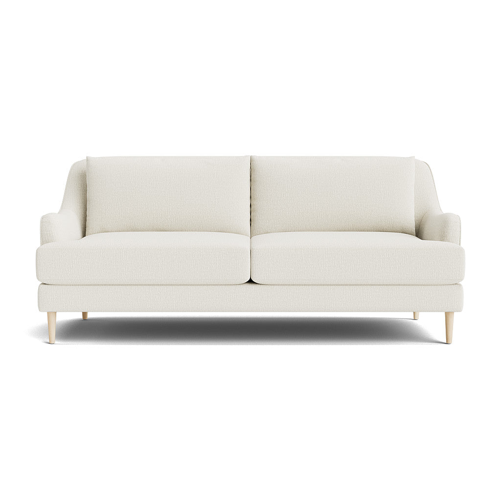 The Kaydan Sofa is a light grey, modern two-seater featuring plush cushions and wooden legs. With its clean, minimalist design, it's perfect for contemporary living spaces. Positioned against a plain white background, the sofa's sleek and elegant appearance is perfectly highlighted.