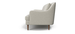 Side view of the Kaydan Sofa in a modern, light gray color, featuring clean lines, a cushioned back and seat, and tapered wooden legs, set against a white background.