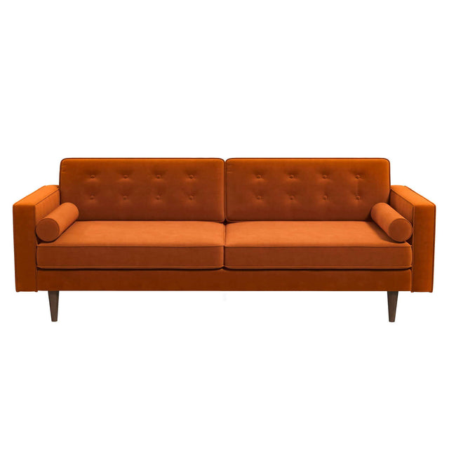 The Casey Mid Century Modern Sofa features an orange color with tufted cushions, two cylindrical bolster pillows, a sleek minimalist design, and wooden tapered legs.
