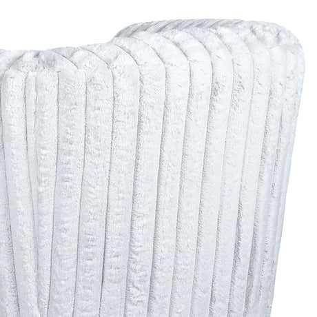 A close-up of the Mira—Modern Comfort Swivel Chair showcases its plush, light gray, vertically ribbed fabric with a soft, velvety texture. The folded design forms gentle curves and shadows, highlighting its cozy and luxurious appearance.