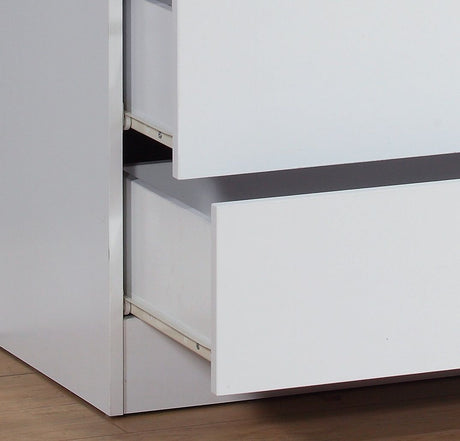 Close-up of a partially open top drawer in the 5 Drawer Chest, showcasing the metal glide rails and inner space, placed on a light-colored wooden floor.