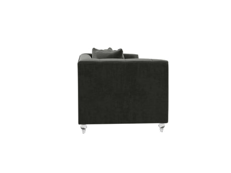 Side view of the Bea Velvet Tufted Sofa in dark green with square arms and two matching cushions, supported by four glossy, transparent legs against a plain white background.