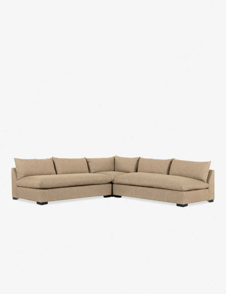 The Decima Sectional Sofa in beige, featuring plush cushions and an L-shaped design, set against a plain white background.