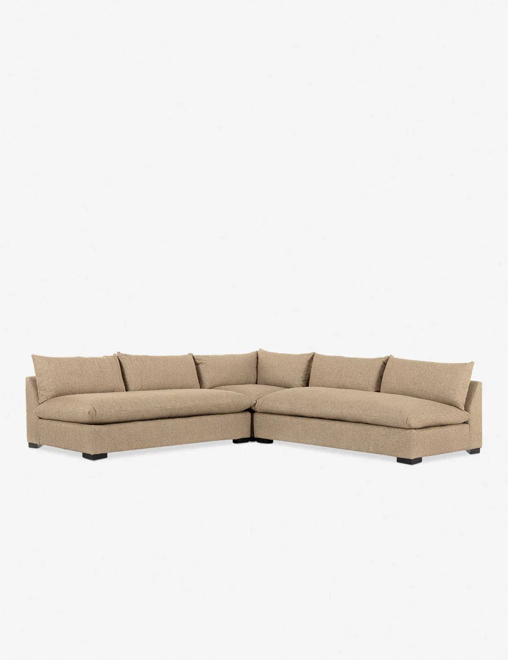 The Decima Sectional Sofa in beige, featuring plush cushions and an L-shaped design, set against a plain white background.