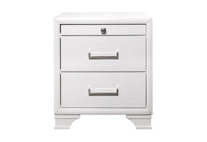 The Civic - Nightstand is a white, modern piece with two drawers featuring textured fronts and metallic handles. The top drawer has a centered lock, and it stands on short, curved legs for a clean aesthetic.