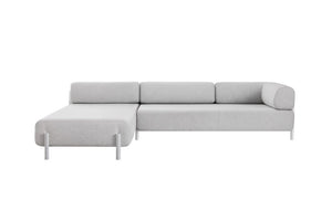 The Palo 3-seater Sofa is a modern, L-shaped piece with clean lines and a minimalistic design, set against a white background. It includes a chaise lounge on the left side and is supported by cylindrical metal legs.