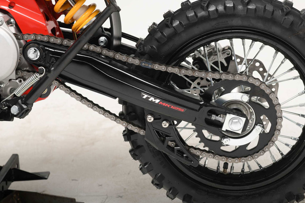 TrailMaster MK125 Dirt Bike 4-Speed Manual Dual Disc Brakes, Electric Start (14/12), Ages 12 and up