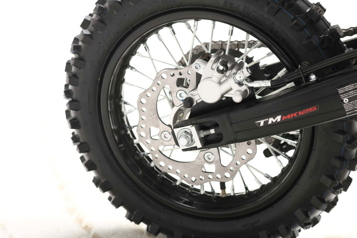 TrailMaster MK125 Dirt Bike 4-Speed Manual Dual Disc Brakes, Electric Start (14/12), Ages 12 and up