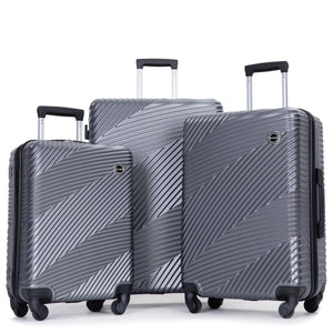 A matching 3 Piece Luggage Set stands upright in varying sizes, featuring a textured diagonal line design in silver with black handles and spinner wheels.