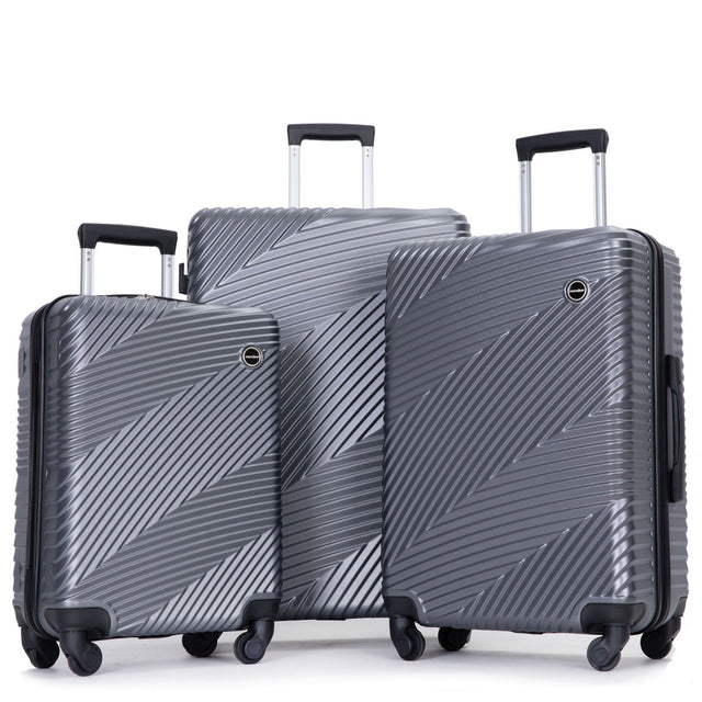 A matching 3 Piece Luggage Set stands upright in varying sizes, featuring a textured diagonal line design in silver with black handles and spinner wheels.