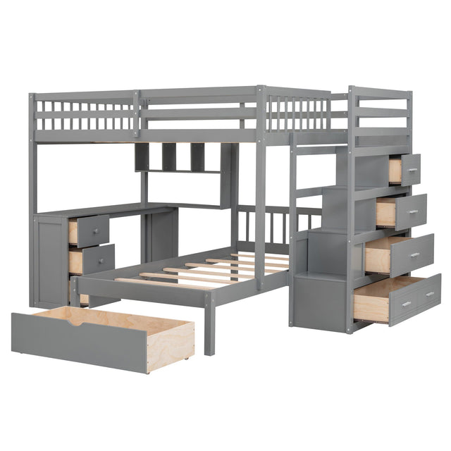 The Bunk Bed With Desk, Drawers And Shelves has a gray loft design with a left-side staircase featuring built-in drawers, a right-side desk area with shelves, and extra storage space under the bed frame.