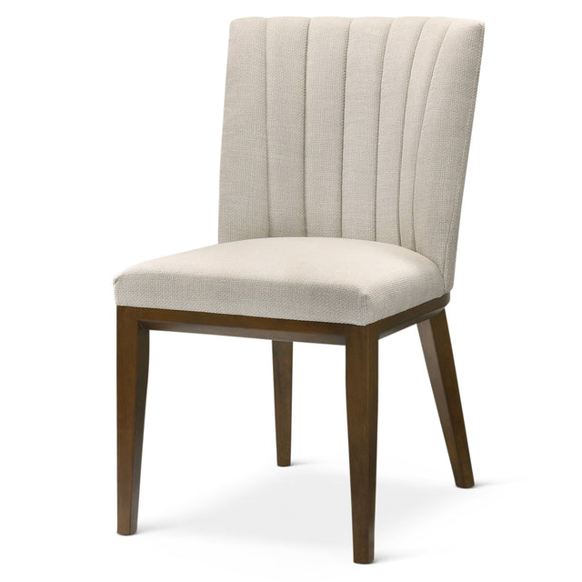 The Elmwood Stylish Dining Chair Set of 2 features beige upholstery with vertical tufting on the backrest, complemented by a wooden frame and four tapered legs for a sleek, modern look.