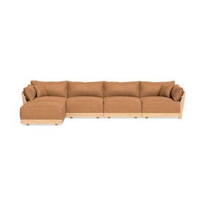 The Modular Bondi Latte 4 Seater Sectional is a spacious L-shaped sectional sofa featuring brown cushions and a light wood frame on a white background. It includes four seating sections and wide armrests, offering both comfort and a modern design.