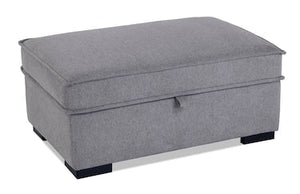 A gray upholstered sectional chaise with a liftable top and black legs.