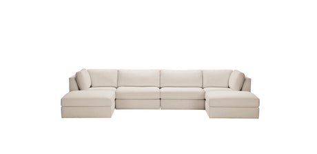The Daydreamer Modular Six-Piece Sectional is a beige sofa with clean lines and plush cushions, comprising multiple sections including left and right armrests and a central wedge, set against a plain white background.