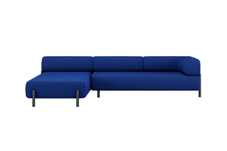 Introducing the Palo 3-seater Sofa: a modern L-shaped sectional in blue, featuring a left-side chaise lounge and sleek black legs. It boasts thick cushions and a minimalist design.