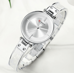 Womens Elegant Stainless Steel Watch With Ceramic Bracelet In Shimmering Marble Colors