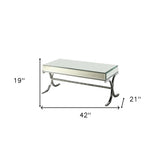 42" Clear and Silver Mirrored Glass And Iron Sled Coffee Table