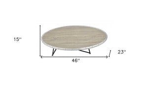 46" Natural and Black Wood And Iron Round Abstract Coffee Table