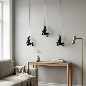 Set of Three Black Resin Climbing Man Hanging Dimensional Sculpture