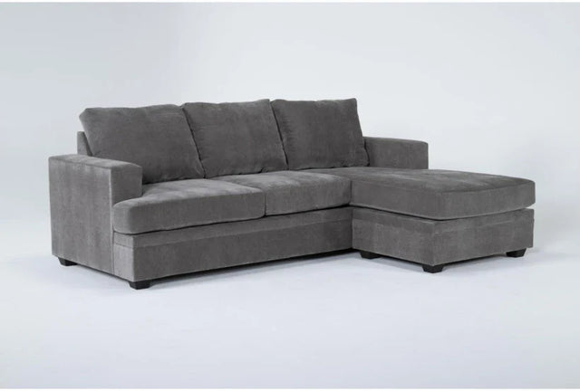 Bonaterra 97 Inch Queen Sleeper Sofa in gray, featuring plush cushions and an upholstered chaise on the right side, positioned against a plain white background.