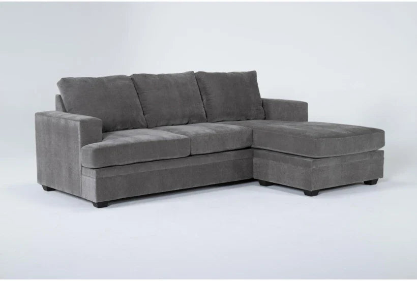Bonaterra 97 Inch Queen Sleeper Sofa in gray, featuring plush cushions and an upholstered chaise on the right side, positioned against a plain white background.