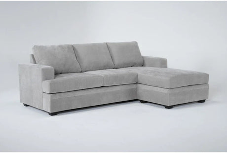 A Bonaterra 97 Inch Queen Sleeper Sofa, a modern gray sectional with plush cushions and armrests, includes a chaise lounge on the right side and is set against a plain white background.