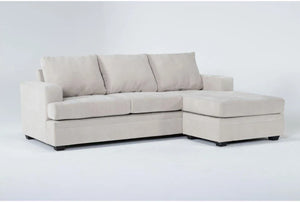 A beige Bonaterra 97 Inch Queen Sleeper Sofa, featuring an L-shaped design with plush cushions and a right-side chaise lounge, set against a plain white background.