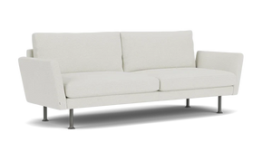 Introducing the Form 92" Sofa: a modern minimalist piece in white, showcasing a clean design with two back cushions and sleek metal legs. Its boxy shape is complemented by slightly angled armrests, all set against a plain black background.