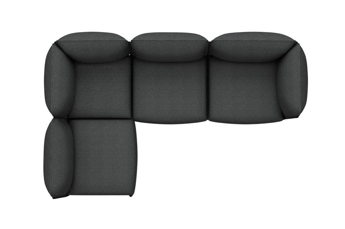 Top view of the Kumo Corner Sofa Left with Armrest in a dark gray color, featuring an L-shaped design with rounded edges. The cushioned sofa is configured with one longer side and one shorter side.
