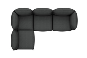 Top view of the Kumo Corner Sofa Left with Armrest in a dark gray color, featuring an L-shaped design with rounded edges. The cushioned sofa is configured with one longer side and one shorter side.