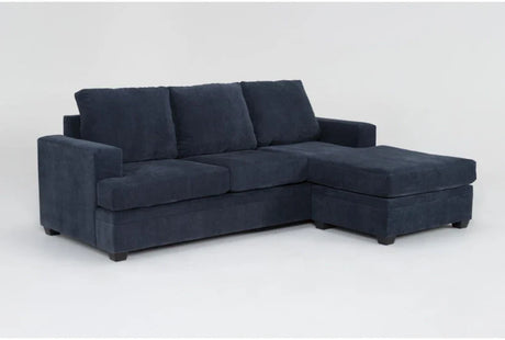 The Bonaterra 97 Inch Queen Sleeper Sofa is a dark blue sectional featuring a chaise on the right side, with three large cushions on the backrest, set against a plain white background.