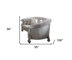 55" Ivory Velvet Curved Floral Sofa And Toss Pillows With Gray Legs