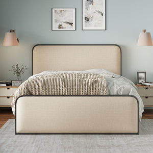 A beige modern bed with a curved upholstered headboard and footboard, adorned with a knitted throw and light gray bedding, is in a contemporary bedroom. Two bedside tables hold lamps and decor, while abstract art on the green wall and a soft area rug complete the cozy space.